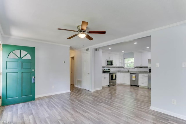 541 Mango Dr, Virginia Beach, VA 23452 - unfurnished living room with ornamental molding, a ceiling fan, light wood-style floors, baseboards, and recessed lighting