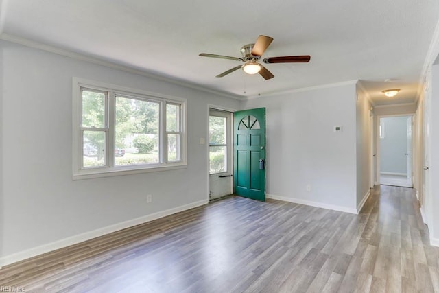 541 Mango Dr, Virginia Beach, VA 23452 - spare room featuring wood finished floors, ornamental molding, ceiling fan, and baseboards