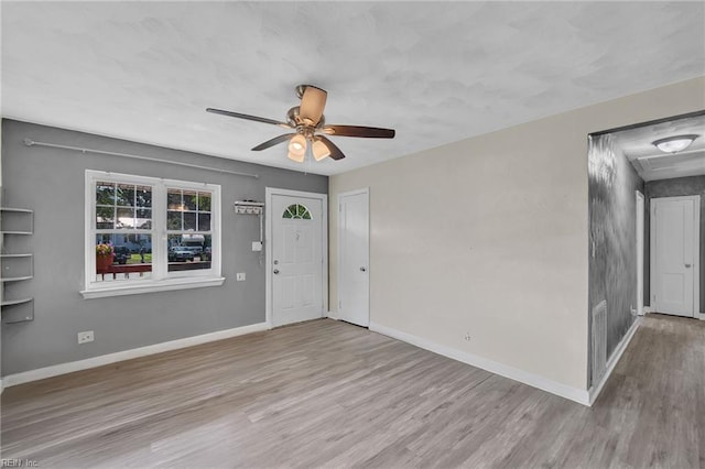 6413 Natrona Ave, Norfolk, VA 23509 - foyer entrance featuring wood finished floors, baseboards, and a ceiling fan