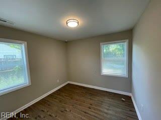 1496 Morgan Dr, Hampton, VA 23663 - spare room featuring plenty of natural light, baseboards, and wood finished floors