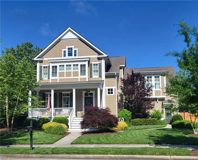 2408 Mathews Green Rd, Virginia Beach, VA 23456 - view of front of property with covered porch and a front yard