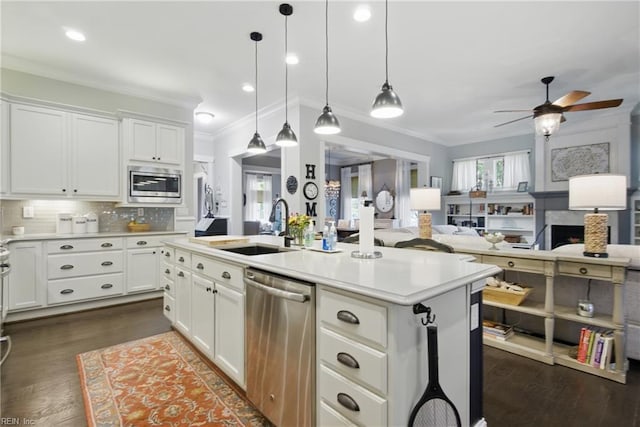 2408 Mathews Green Rd, Virginia Beach, VA 23456 - kitchen with stainless steel appliances, a sink, ceiling fan, dark wood-style flooring, and ornamental molding