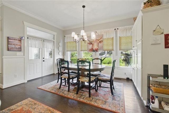 2408 Mathews Green Rd, Virginia Beach, VA 23456 - dining space featuring a chandelier, crown molding, dark wood-style flooring, and a wainscoted wall