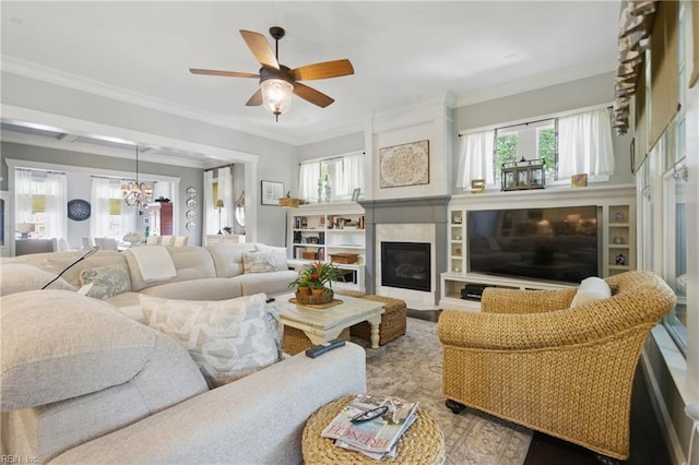 2408 Mathews Green Rd, Virginia Beach, VA 23456 - living room featuring plenty of natural light, crown molding, a chandelier, a premium fireplace, and a ceiling fan