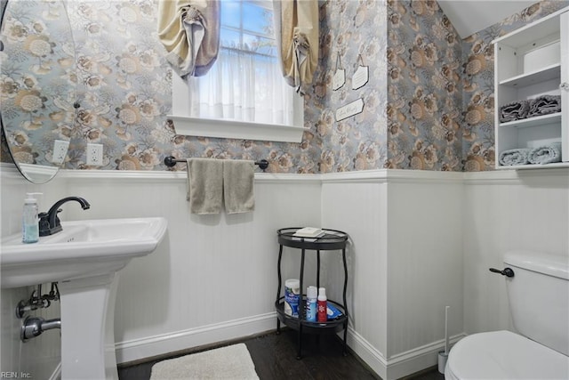 2408 Mathews Green Rd, Virginia Beach, VA 23456 - bathroom featuring a wainscoted wall, toilet, baseboards, wood finished floors, and wallpapered walls