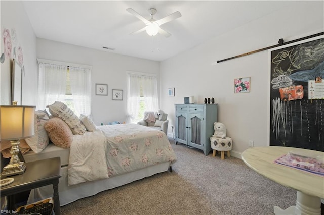 2408 Mathews Green Rd, Virginia Beach, VA 23456 - bedroom featuring carpet, ceiling fan, a barn door, and baseboards