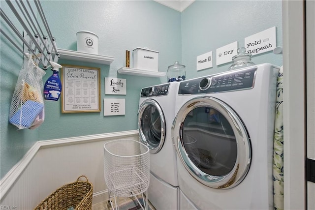 2408 Mathews Green Rd, Virginia Beach, VA 23456 - laundry area with washer and dryer and a wainscoted wall