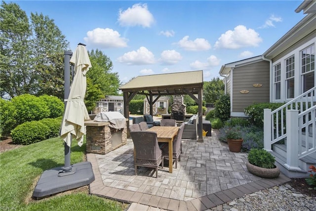 2408 Mathews Green Rd, Virginia Beach, VA 23456 - view of patio featuring a gazebo, exterior kitchen, a fireplace, and outdoor dining area