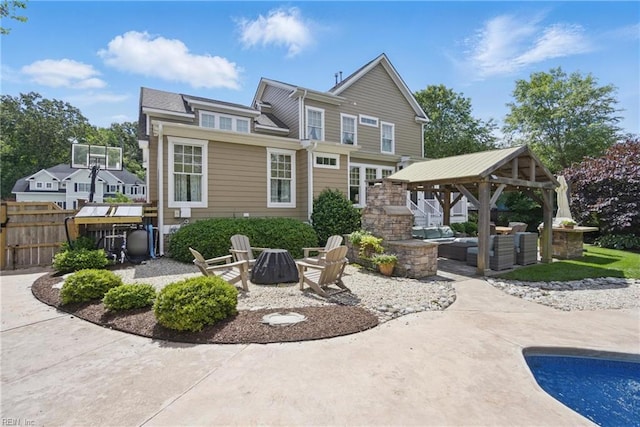 2408 Mathews Green Rd, Virginia Beach, VA 23456 - rear view of house featuring a gazebo, a patio area, and an outdoor living space with a fire pit