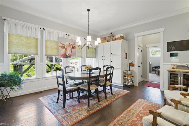 2408 Mathews Green Rd, Virginia Beach, VA 23456 - dining area with a chandelier, dark wood-type flooring, and ornamental molding