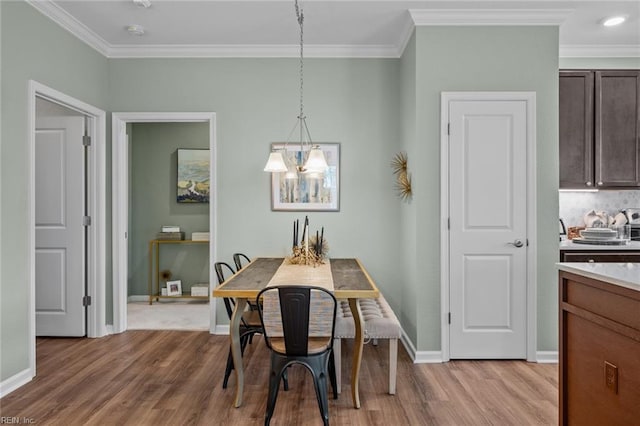 1720 Vankar Dr, Virginia Beach, VA 23456 - dining room with light wood-style floors, crown molding, a chandelier, and baseboards