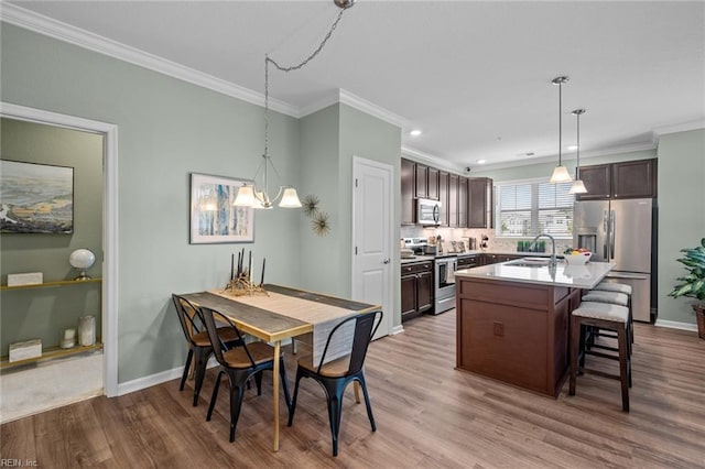 1720 Vankar Dr, Virginia Beach, VA 23456 - dining room with ornamental molding, wood finished floors, baseboards, and recessed lighting
