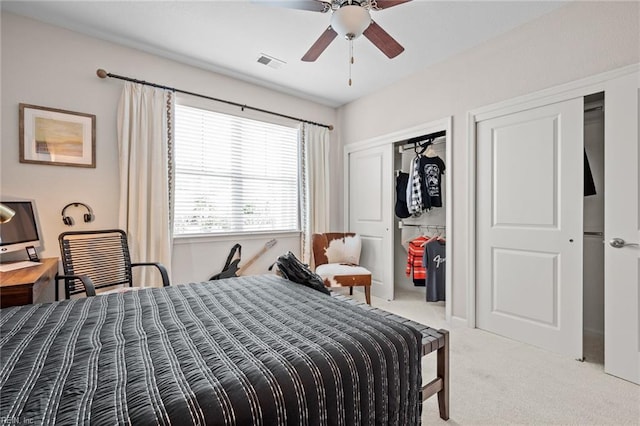 1720 Vankar Dr, Virginia Beach, VA 23456 - carpeted bedroom with multiple closets and a ceiling fan
