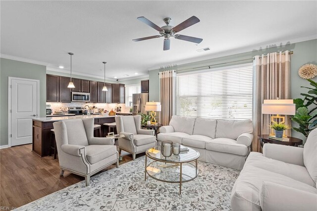 1720 Vankar Dr, Virginia Beach, VA 23456 - living room with ornamental molding, wood finished floors, a ceiling fan, recessed lighting, and baseboards