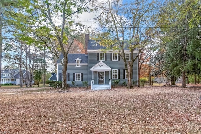 221 Homestead Rd, Franklin, VA 23851 - colonial-style house featuring a chimney