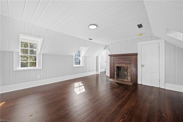 221 Homestead Rd, Franklin, VA 23851 - unfurnished living room with hardwood / wood-style floors, lofted ceiling, a fireplace, and baseboards