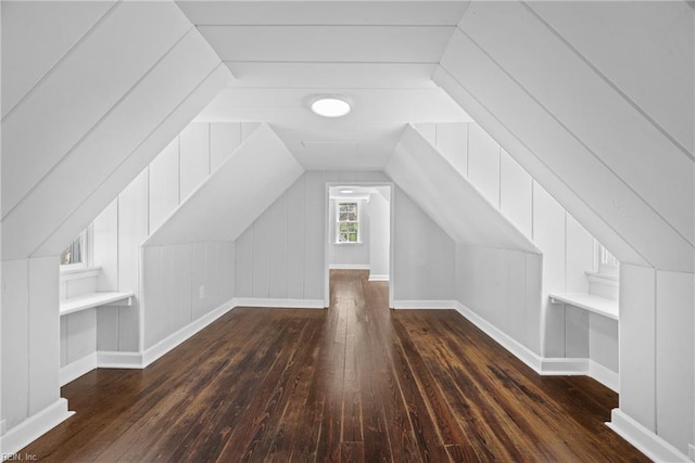 221 Homestead Rd, Franklin, VA 23851 - additional living space with dark wood-style flooring, lofted ceiling, and baseboards