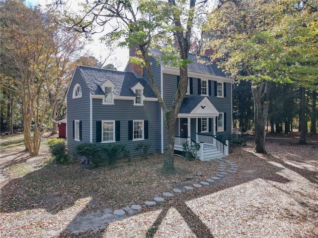 221 Homestead Rd, Franklin, VA 23851 - colonial inspired home featuring covered porch and a chimney