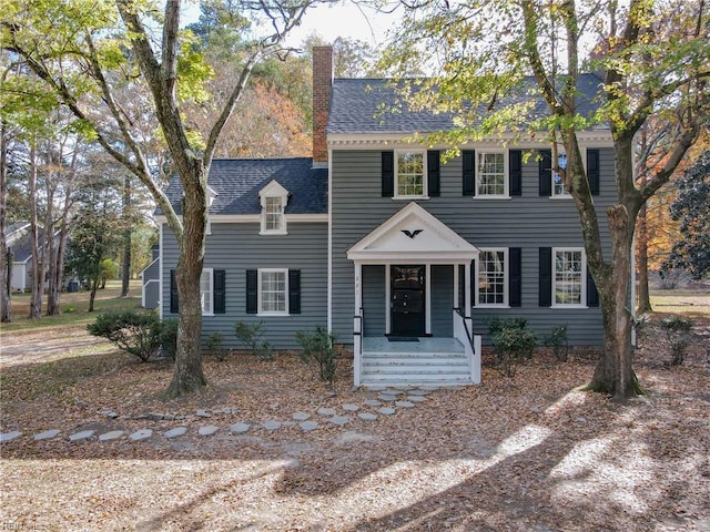 221 Homestead Rd, Franklin, VA 23851 - colonial-style house with a chimney and a shingled roof