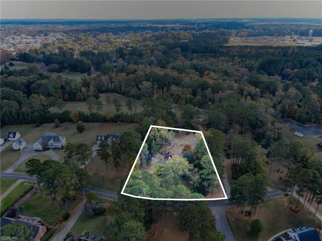221 Homestead Rd, Franklin, VA 23851 - aerial overview of property's location with property boundaries highlighted and a heavily wooded area