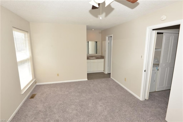 3861 Chancery Ln, Virginia Beach, VA 23452 - unfurnished room with ceiling fan, healthy amount of natural light, dark colored carpet, baseboards, and a textured ceiling