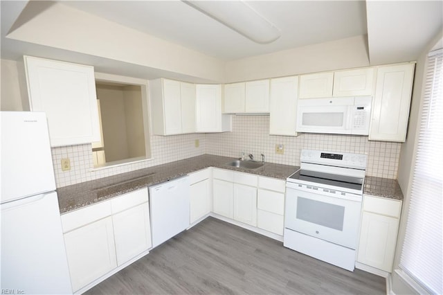 3861 Chancery Ln, Virginia Beach, VA 23452 - kitchen with white appliances, a sink, white cabinetry, light wood-style floors, and tasteful backsplash