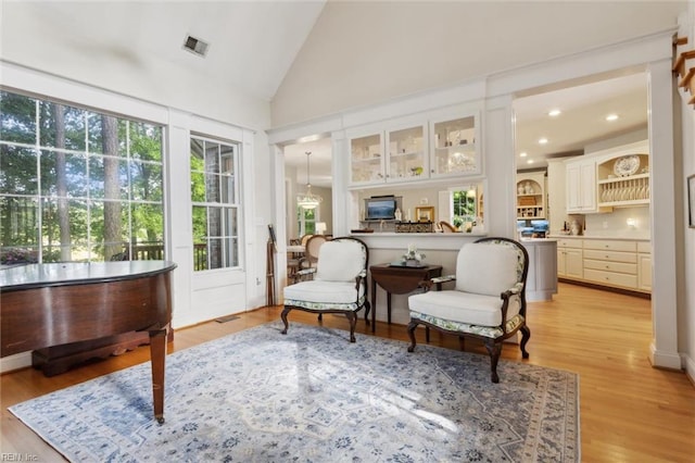 20524 Creekside Dr, Smithfield, VA 23430 - living area featuring light wood-style floors, high vaulted ceiling, and recessed lighting