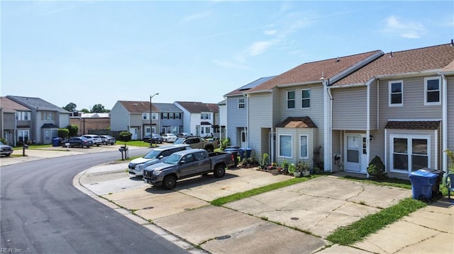 3531 Woodburne Dr, Virginia Beach, VA 23452 - view of asphalt road with a residential view, street lights, and sidewalks
