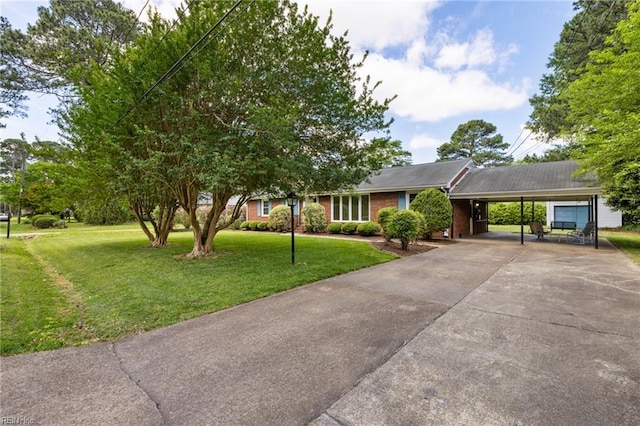 4422 Gannon Rd, Portsmouth, VA 23703 - ranch-style home with a carport, a front yard, driveway, and brick siding