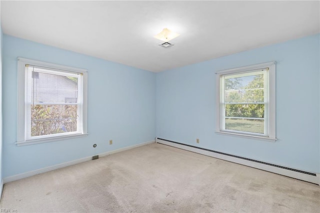 4422 Gannon Rd, Portsmouth, VA 23703 - carpeted spare room with a baseboard radiator and baseboards