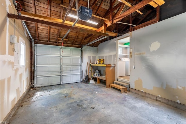 624 Highland Ct, Newport News, VA 23605 - garage featuring a garage door opener and washer / dryer