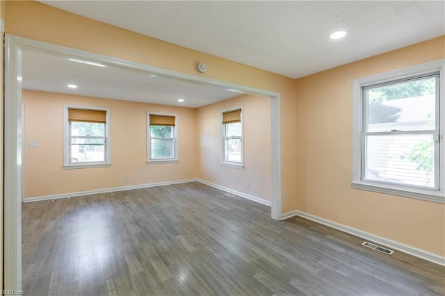 624 Highland Ct, Newport News, VA 23605 - unfurnished room featuring wood finished floors, healthy amount of natural light, baseboards, and recessed lighting