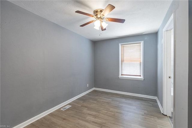 624 Highland Ct, Newport News, VA 23605 - spare room featuring a ceiling fan, wood finished floors, baseboards, and a textured ceiling