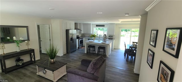 175 Pinto Dr, Moyock, NC 27958 - living area featuring dark wood-style flooring, baseboards, and recessed lighting