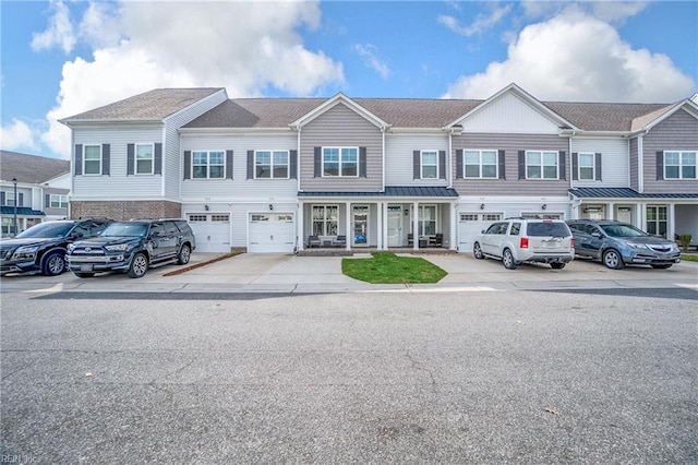 316 Sikeston Ln, Chesapeake, VA 23322 - multi unit property with driveway, covered porch, an attached garage, and roof with shingles