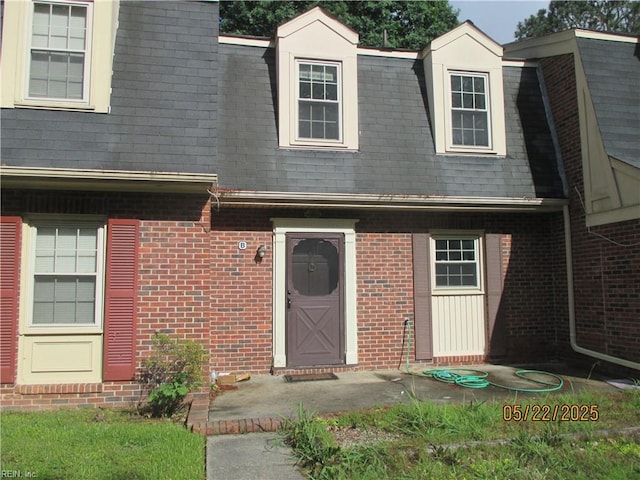 386 Deputy Ln Unit B, Newport News, VA 23608 - view of front of house featuring roof with shingles and brick siding