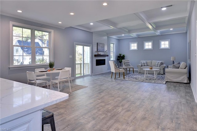 718C Poquoson Ave, Poquoson, VA 23662 - living room featuring recessed lighting, wood finished floors, beam ceiling, a fireplace, and baseboards