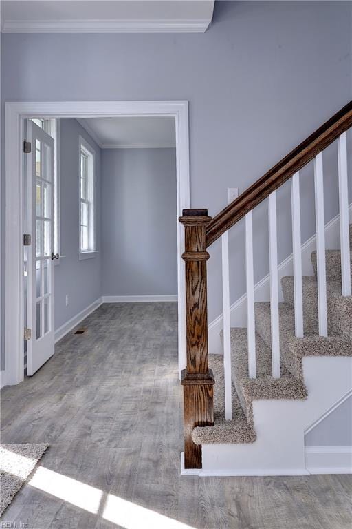 718C Poquoson Ave, Poquoson, VA 23662 - staircase featuring ornamental molding, wood finished floors, and baseboards