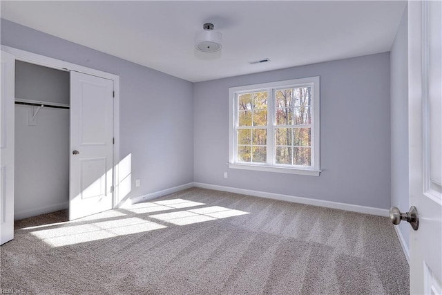 718C Poquoson Ave, Poquoson, VA 23662 - unfurnished bedroom with carpet flooring, baseboards, and a closet