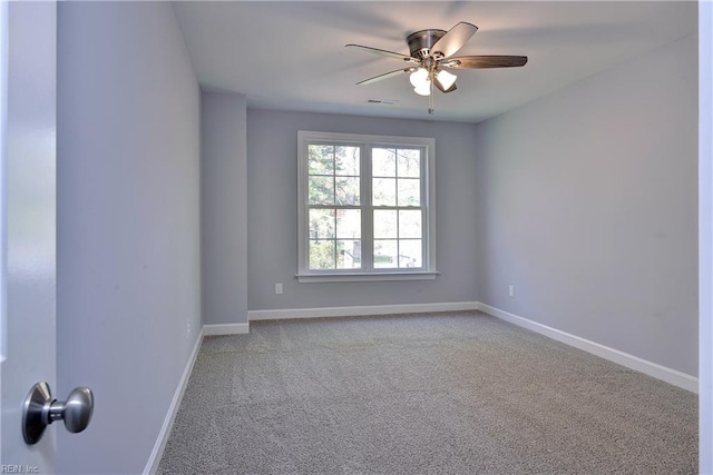 718C Poquoson Ave, Poquoson, VA 23662 - empty room featuring ceiling fan, carpet, and baseboards