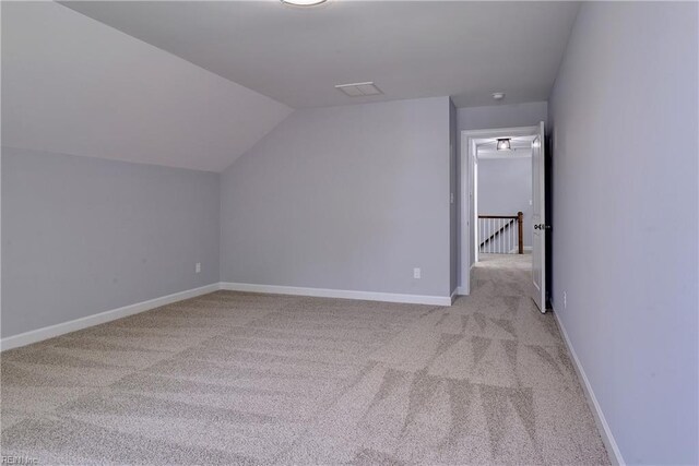 718C Poquoson Ave, Poquoson, VA 23662 - bonus room with light colored carpet, vaulted ceiling, and baseboards