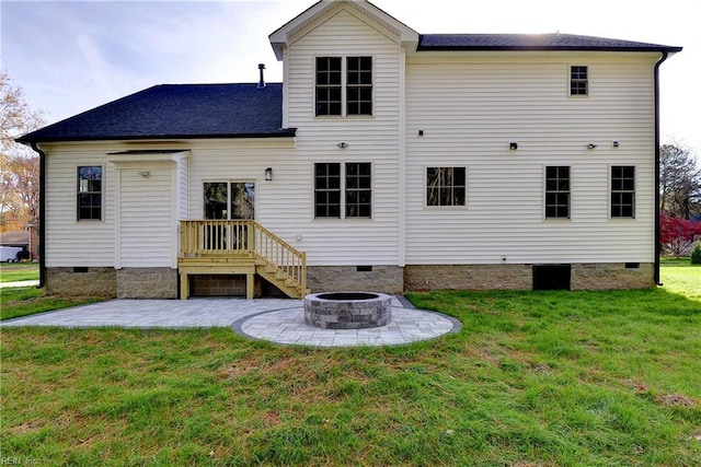 718C Poquoson Ave, Poquoson, VA 23662 - back of house featuring crawl space, a patio area, a fire pit, and a lawn