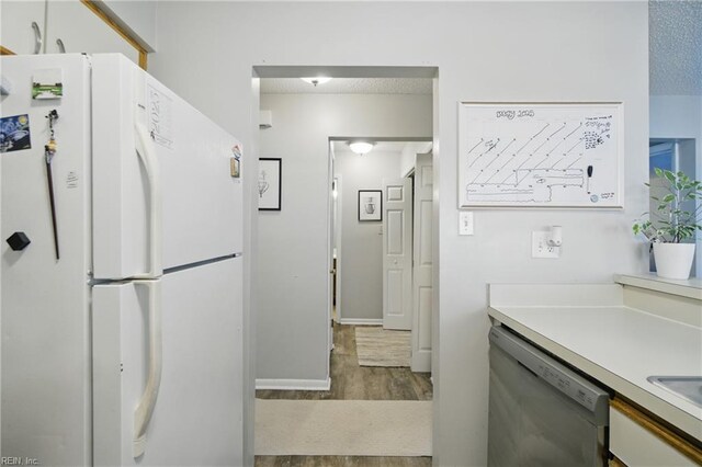 5165 Thatcher Way, Virginia Beach, VA 23456 - kitchen featuring freestanding refrigerator, dishwasher, wood finished floors, light countertops, and baseboards