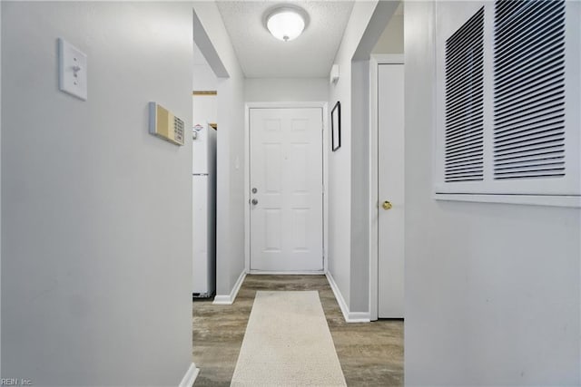 5165 Thatcher Way, Virginia Beach, VA 23456 - corridor featuring wood finished floors, baseboards, and a heating unit
