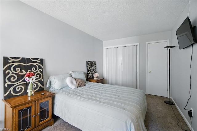 5165 Thatcher Way, Virginia Beach, VA 23456 - carpeted bedroom featuring a closet and a textured ceiling