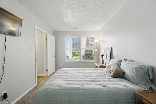 5165 Thatcher Way, Virginia Beach, VA 23456 - carpeted bedroom with a textured ceiling and baseboards
