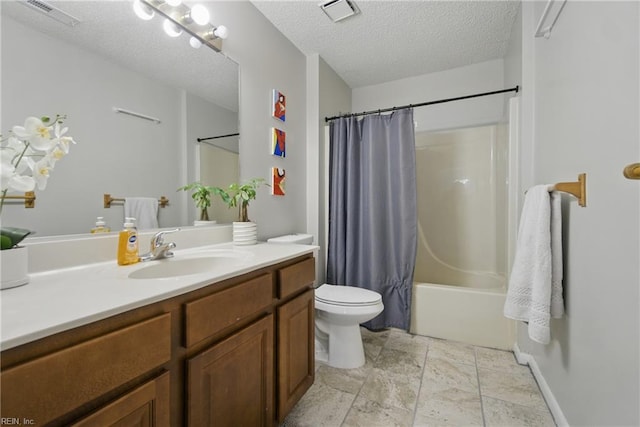 5165 Thatcher Way, Virginia Beach, VA 23456 - bathroom featuring vanity, toilet, shower / bath combo with shower curtain, and a textured ceiling