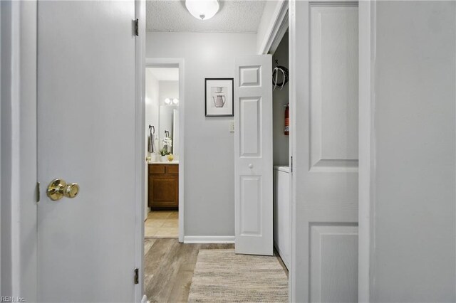 5165 Thatcher Way, Virginia Beach, VA 23456 - hall with light wood-type flooring and a textured ceiling
