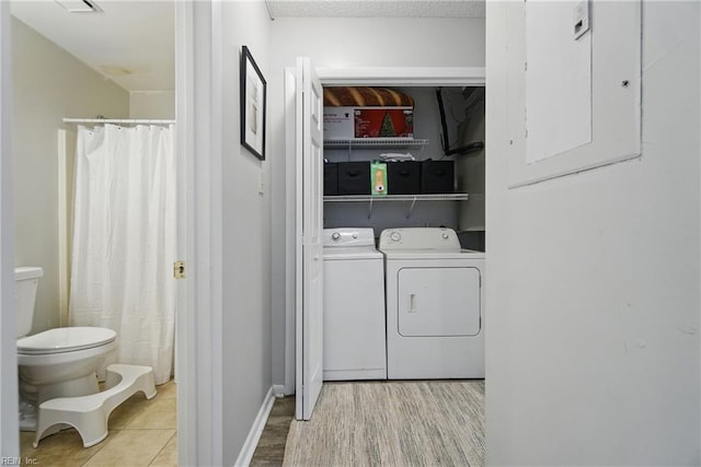 5165 Thatcher Way, Virginia Beach, VA 23456 - washroom featuring separate washer and dryer and light wood-type flooring