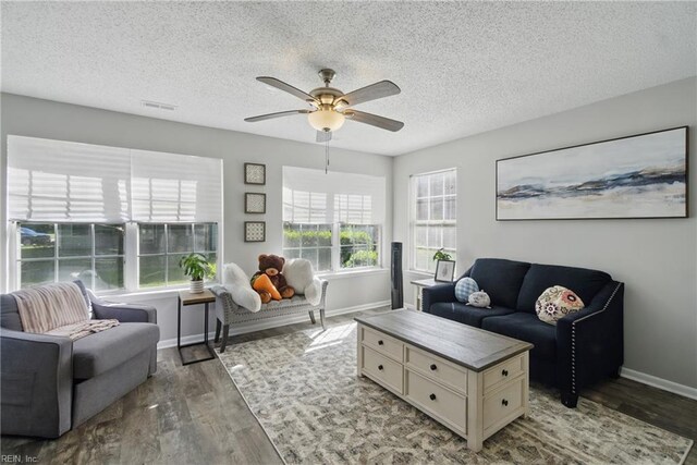 5165 Thatcher Way, Virginia Beach, VA 23456 - living area with a textured ceiling, a ceiling fan, wood finished floors, and baseboards